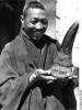 Tibet monk with horn
